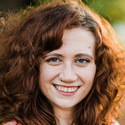 Headshot of Hannah smiling