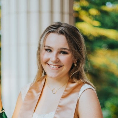 Headshot of Chloe smiling