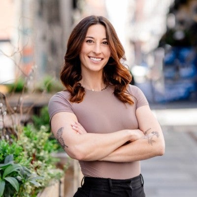 Portrait of Brooke outside smiling